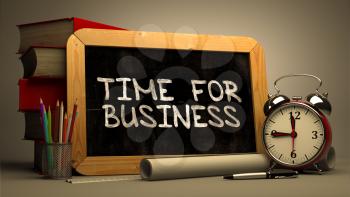 Handwritten Time for Business on a Chalkboard. Composition with Chalkboard and Stack of Books, Alarm Clock and Rolls of Paper on Blurred Background. Toned Image. 3D Render.