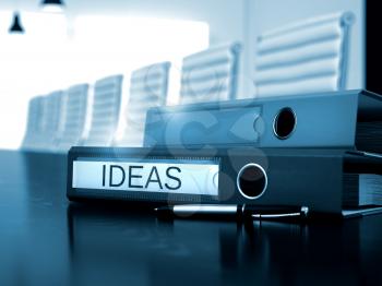 Ideas - Ring Binder on Desktop. Ideas. Business Concept on Blurred Background. File Folder with Inscription Ideas on Desktop. Ideas - Business Concept on Blurred Background. 3D Render.