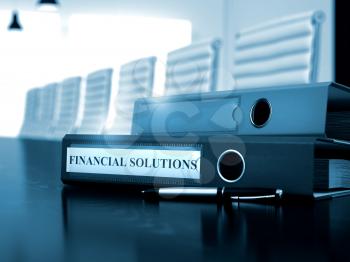 Financial Solutions - Ring Binder on Wooden Desktop. Financial Solutions - Business Concept on Toned Background. 3D Render.