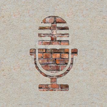 Microphone Icon on the Brick and Plastered Wall.