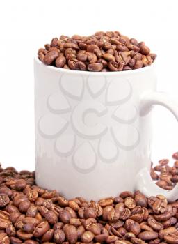 Cup with coffee beans isolated on a white background