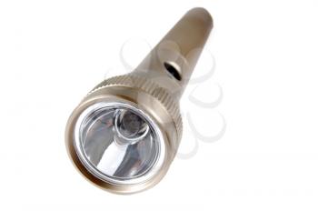 Macro shot of a metal flashlight isolated on white