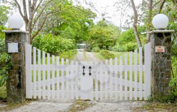 Small wooden gate at the entrance of a summer home