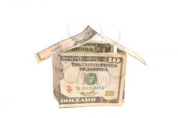 House shape made with dollar bills depicting property value