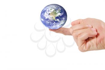 Planet earth on a finger isolated on white