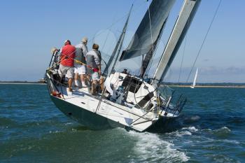 A racing yacht trying to catch up with the other boats in the race.