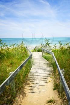 Wooden path over dunes at beach. Pinery provincial park, Ontario Canada