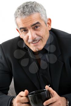 Happy mature man drinking tea, smiling, isolated on white background.
