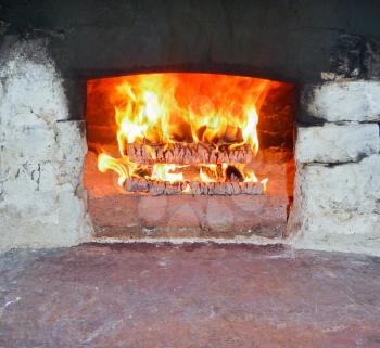 Burning Firewood in the brick Furnace
