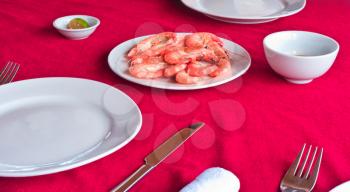 Fresh delicious prawns served on white plate in vietnamese restaurant