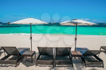 Royalty Free Photo of Beach Umbrellas and Loungers at Boracay, Philippines