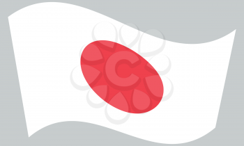 Flag of Japan waving on gray background