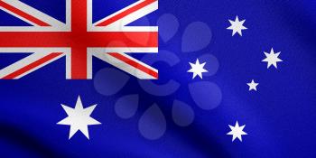 Flag of Australia waving in the wind with detailed fabric texture. Australian national flag.