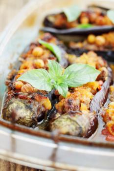 Baked eggplant stuffed with minced meat, chick-pea and vegetables