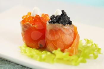 Smoked salmon stuffed with red and black caviar