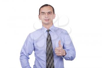 Male businessman showing thumb up gesture against white background.