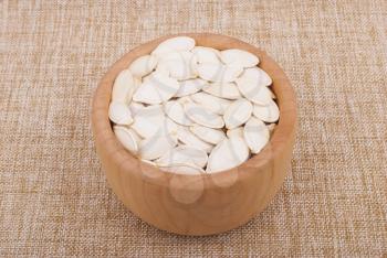 Pumpkin seeds in a bowl.