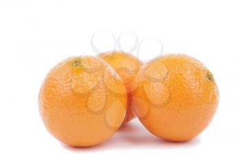 Fresh ripe tangerines on a white background.