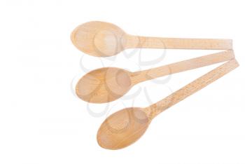 Wooden spoons isolated on a white background.