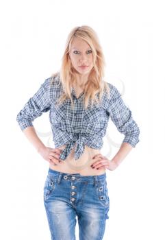 Beautiful girl in a plaid shirt and jeans on white background.