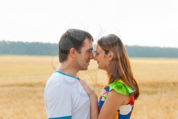 Couple of lovers hugging outdoors.