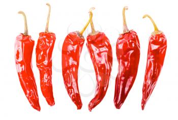Dried red hot chili peppers isolated on white background