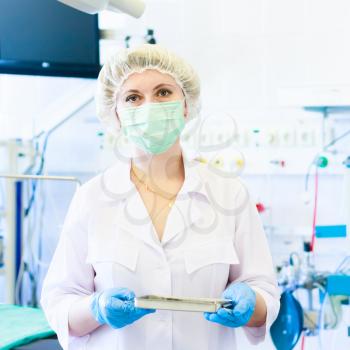 Female Surgeon Nurse In Operation Room