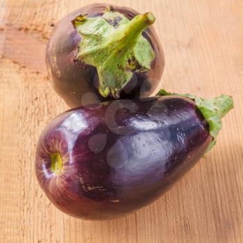 Healthy Organic Vegetables Eggplants On A Wooden Background