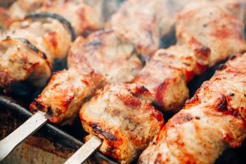 Grilled Marinated Caucasus Barbecue Meat Shashlik (Shish Kebab) Pork Meat Grilling On Metal Skewer, Close Up