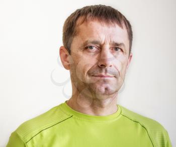 Portrait Of Casual Man In Green T-Shirt