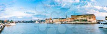 Scenic view of Embankment In Old Part Of Stockholm At Summer Evening, Sweden. Panorama