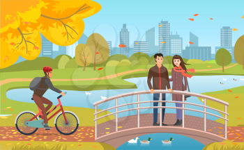 Autumn park with guy in helmet riding bicycle, couple on bridge over pond, windy weather. Flying fall leaves and city skyscrapers vector illustration.