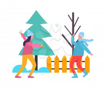 Children playing snowballs at wintertime. Kids fighting with snow near fence with bare tree and fir or spruce. Winter active games, isolated people