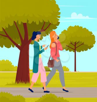 Female girlfriends walking and talking on mobile phone in park, girl communicating with smartphone. Girl chatting with friend on phone holds portable device in hand has fun conversation outdoor