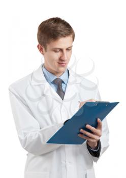 Doctor writes a clipboard. isolated on white background