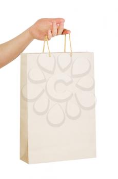 human hand carry blank slate beige paper bag isolated on white background 
