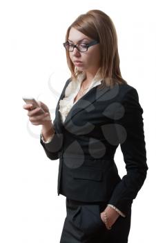 young woman sends a message from a mobile phone. Isolated on white background.