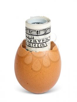 roll of money inside a broken egg. isolated on white