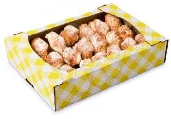 pile of cookies in a cardboard box isolated on white background