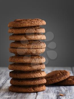 Oatmeal cookies on a wooden table close up