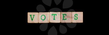 Letters on wooden blocks (votes)