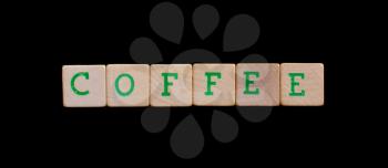 Green letters on old wooden blocks (coffee)