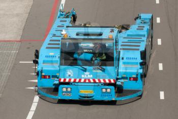 AMSTERDAM - MAY 11: KLM tow truck for airplanes at Shiphol airport on May 11, 2012, Amsterdam, The Netherlands.