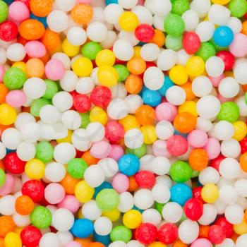 Coated candy, many different colored small balls