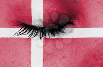 Crying woman, pain and grief concept, flag of Denmark