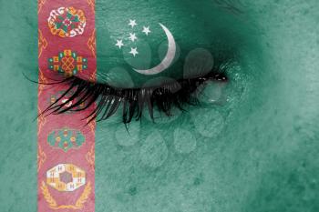Crying woman, pain and grief concept, flag of Turkmenistan