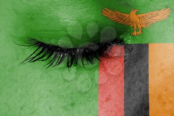 Crying woman, pain and grief concept, flag of Zambia
