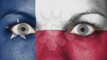 Close up of eyes. Painted face with flag of Texas