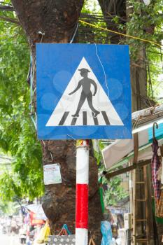 Pedestrian crossing sign in the center of Hanoi (Vietnam)