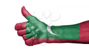 Old woman giving the thumbs up sign, isolated, flag of Maldives